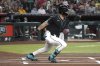 Arizona Diamondbacks' Corbin Carroll hits against the San Diego Padres in the first inning during a baseball game, Saturday, June 14, 2025, in Phoenix. (AP Photo/Rick Scuteri)