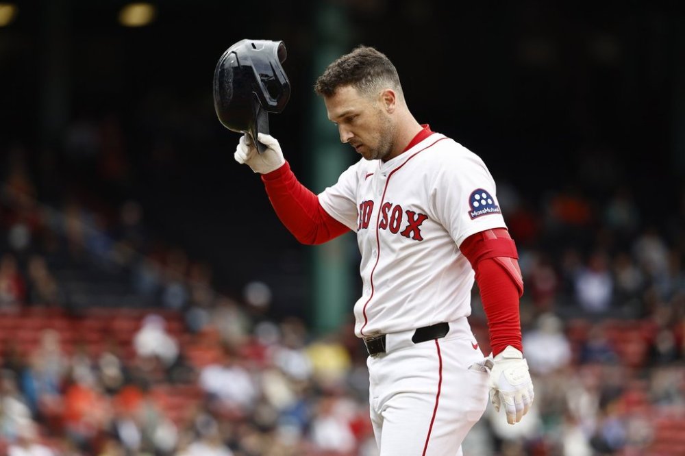 FILE - Boston Red Sox's Alex Bregman heads for the dugout after injuring himself on a single against the Baltimore Orioles during the fifth inning in the first baseball game of a doubleheader on May 23, 2025, at Fenway Park in Boston. (AP Photo/Winslow Townson, File)