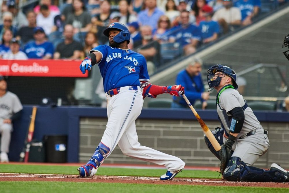 Toronto Blue Jays first base Vladimir Guerrero Jr. (27) swings on a strike during first inning MLB baseball action in Toronto, on Wednesday, July 2, 2025. THE CANADIAN PRESS/Sammy Kogan