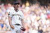 Milwaukee Brewers' Trevor Megill reacts after recording a save during the ninth inning of a baseball game against the St. Louis Cardinals, Sunday, June 15, 2025, in Milwaukee. (AP Photo/Aaron Gash)