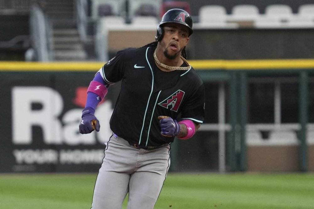 Arizona Diamondbacks' Ketel Marte rounds the bases after hitting a solo home run during the first inning of a baseball game against the Chicago White Sox in Chicago, Tuesday, June 24, 2025. (AP Photo/Nam Y. Huh)