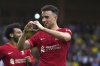 FILE - Liverpool's Diogo Jota celebrates scoring during the Premier League match at Carrow Road, Norwich, Saturday Aug. 14, 2021. (Joe Giddens/PA via AP, File)