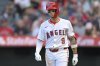 Los Angeles Angels' Zach Neto reacts after being hit by a pitch during the first inning of a baseball game against the Boston Red Sox, Monday, June 23, 2025, in Anaheim, Calif. (AP Photo/Jayne Kamin-Oncea)