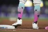Miami Marlins' Dane Myers stands on first base after drawing a walk during the second inning of a baseball game against the San Francisco Giants, Saturday, May 31, 2025, in Miami. (AP Photo/Lynne Sladky)