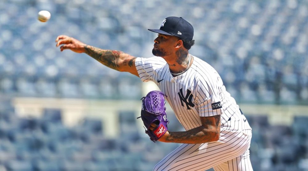 New York Yankees' Luis Gil throws during live batting practice before a baseball game between the New York Yankees and the Baltimore Orioles, Saturday, June 21, 2025, in New York. (AP Photo/Noah K. Murray)