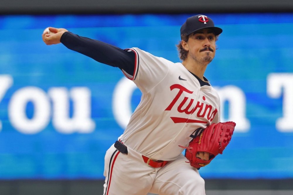 Minnesota Twins starting pitcher Joe Ryan throws to the Seattle Mariners in the first inning of a baseball game Wednesday, June 25, 2025, in Minneapolis. (AP Photo/Bruce Kluckhohn)