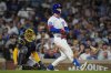Chicago Cubs' Pete Crow-Armstrong (4) hits a home run during the eighth inning of a baseball game against the Milwaukee Brewers, Tuesday, June 17, 2025, in Chicago. (AP Photo/Erin Hooley)