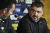 Newly appointed Italian national soccer team head coach Rino Gattuso, right, holds a press conference, in Rome, Thursday, June 19, 2025. (AP Photo/Alessandra Tarantino)