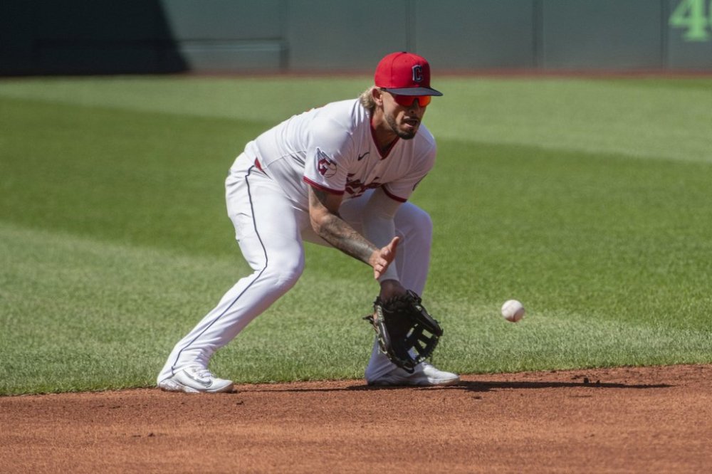 Cleveland Guardians' Gabriel Arias prepares to field a ground ball by St. Louis Cardinals' Nolan Arenado during the first inning of a baseball game, Saturday, June 28, 2025, in Cleveland. (AP Photo/Phil Long)