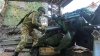 In this photo taken from video distributed by Russian Defense Ministry Press Service on Tuesday, June 24, 2025, a Russian soldier prepares Giatsint-B 152 mm field gun to fire towards Ukrainian position on an undisclosed location in Ukraine. (Russian Defense Ministry Press Service via AP)