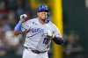 Kansas City Royals' Salvador Perez reacts after hitting a solo home run off Texas Rangers starting pitcher Jack Leiter during the sixth inning of a baseball game Tuesday, June 17, 2025, in Arlington, Texas. (AP Photo/Julio Cortez)
