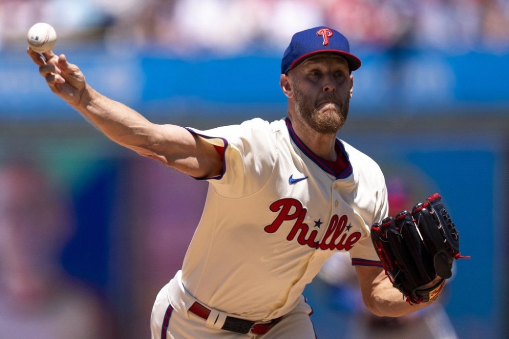 Philadelphia Phillies starting pitcher Zack Wheeler delivers during the first inning of a baseball game against the Cincinnati Reds, Sunday, July 6, 2025, in Philadelphia. (AP Photo/Chris Szagola)