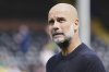 Manchester City's head coach Pep Guardiola looks on ahead of the English Premier League soccer match between Fulham and Manchester City at Craven Cottage, London, Sunday, May 25, 2025. (AP Photo/Dave Shopland)