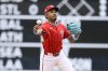 Washington Nationals shortstop Nasim Nunez throws to first base to put out Texas Rangers' Corey Seager during the first inning of a baseball game, Sunday, June 8, 2025, in Washington. (AP Photo/Nick Wass)