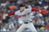 Boston Red Sox pitcher Hunter Dobbins throws against the San Francisco Giants during the first inning of a baseball game in San Francisco, Friday, June 20, 2025. (AP Photo/Jeff Chiu)