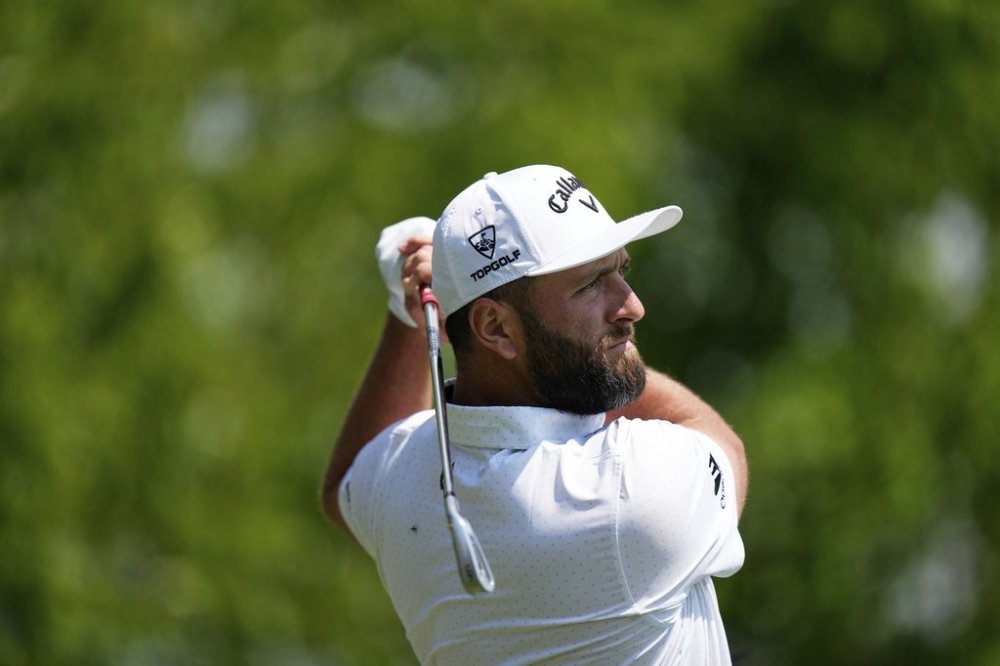 Jon Rahm, of Spain, tees off on the 13th hole during a practice round ahead of the U.S. Open golf tournament at Oakmont Country Club Tuesday, June 10, 2025, in Oakmont, Pa. (AP Photo/Charlie Riedel)