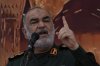 Chief of Iran's paramilitary Revolutionary Guard Gen. Hossein Salami speaks in a ceremony marking the first anniversary of the death of late Iranian President Ebrahim Raisi, who was killed in a helicopter crash in the country's northwest along with the foreign minister and several other officials, in Tehran, Iran, Thursday, May 15, 2025. (AP Photo/Vahid Salemi)