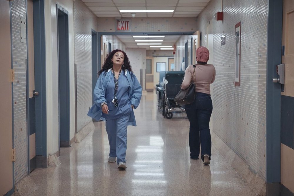 Medical staff walk through a hallway at Brookdale University Hospital and Medical Center on Tuesday, July 1, 2025, in the Brooklyn borough of New York. (AP Photo/Andres Kudacki)