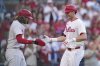 Philadelphia Phillies' Max Kepler, right, and Alec Bohm celebrate after Kepler's two-run home run during the fourth inning in the second baseball game of a doubleheader against the San Diego Padres Wednesday, July 2, 2025, in Philadelphia. (AP Photo/Matt Slocum)