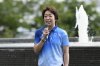 FILE - Seiko Hashimoto, president of the Tokyo Olympic Organizing Committee, speaks during a media tour at the Olympic and Paralympic Village for the Tokyo 2020 Games, constructed in the Harumi waterfront district of Tokyo, Sunday, June 20, 2021. (Akio Kon/Pool Photo via AP, File)
