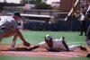 Blue Jays outfielder Jesse Barfield dives safely back to first base as the ball gets away from Texas Rangers first baseman Peter O'Brien in a game at Exhibition Stadium in Toronto on Saturday, Aug. 3, 1985. THE CANADIAN PRESS/Mike Blake