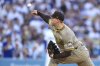 San Diego Padres starting pitcher Stephen Kolek throws to the plate during the first inning of a baseball game against the Los Angeles Dodgers, Wednesday, June 18, 2025, in Los Angeles. (AP Photo/Mark J. Terrill)