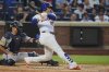 New York Mets' Juan Soto follows through on a home run during the fourth inning of a baseball game against the Atlanta Braves Wednesday, June 25, 2025, in New York. (AP Photo/Frank Franklin II)