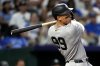 New York Yankees' Aaron Judge hits a home run in the seventh inning during a baseball game against the Kansas City Royals, Wednesday, June 11, 2025, in Kansas City, Mo. (AP Photo/Ed Zurga)