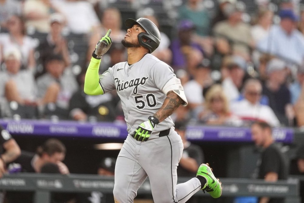 Chicago White Sox's Lenyn Sosa gestures as he circles the bases after hitting a two-run home run off Colorado Rockies starting pitcher Germán Márquez in the second inning of a baseball game Saturday, July 5, 2025, in Denver. (AP Photo/David Zalubowski)