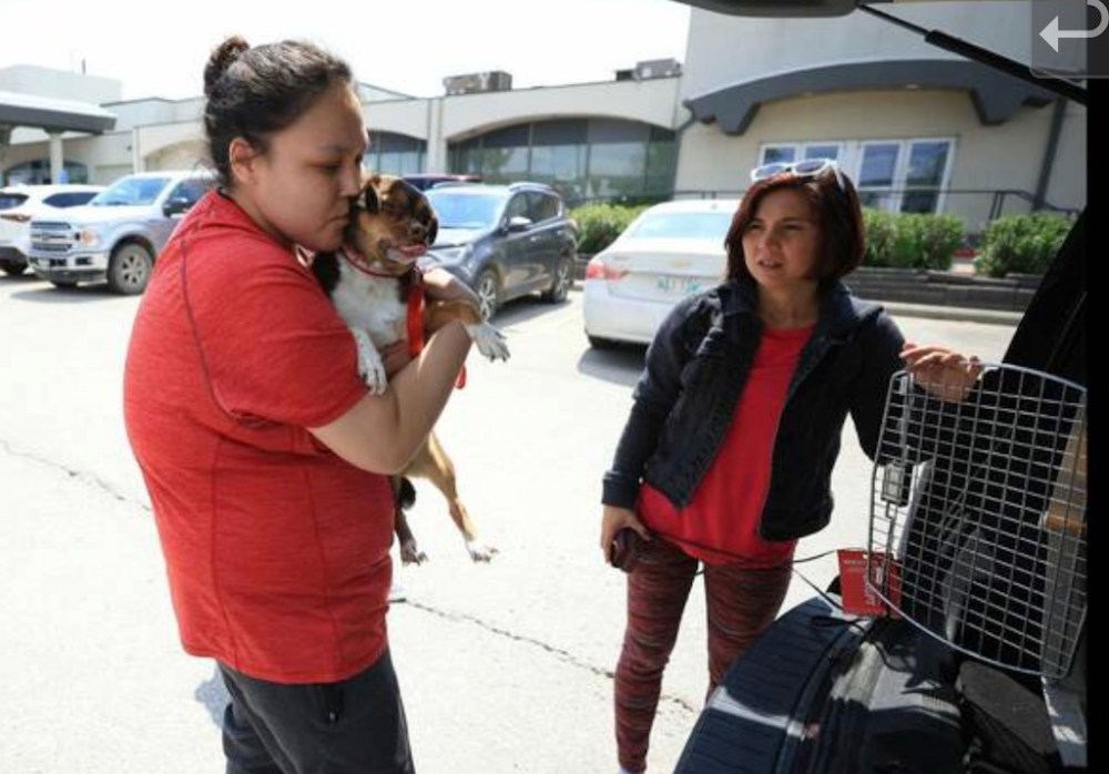 Supplied photo
Darrylee McKay, left, holds her father's dog Buzy, who is being fostered by Beth Olayvar, right, a volunteer with Manitoba Animal Alliance until McKay's family can return to Cross Lake.