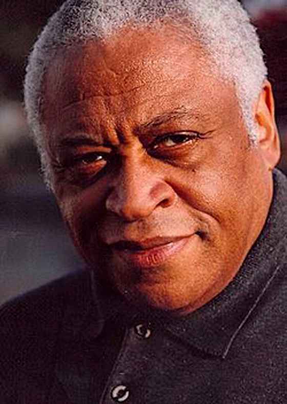 Ron Canada, easily imaginable as mid-ranking authority figure