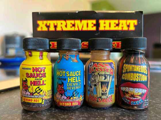This quartet of mini bottles of hot sauce nabbed in San Diego includes, ahem, Ass Blaster.