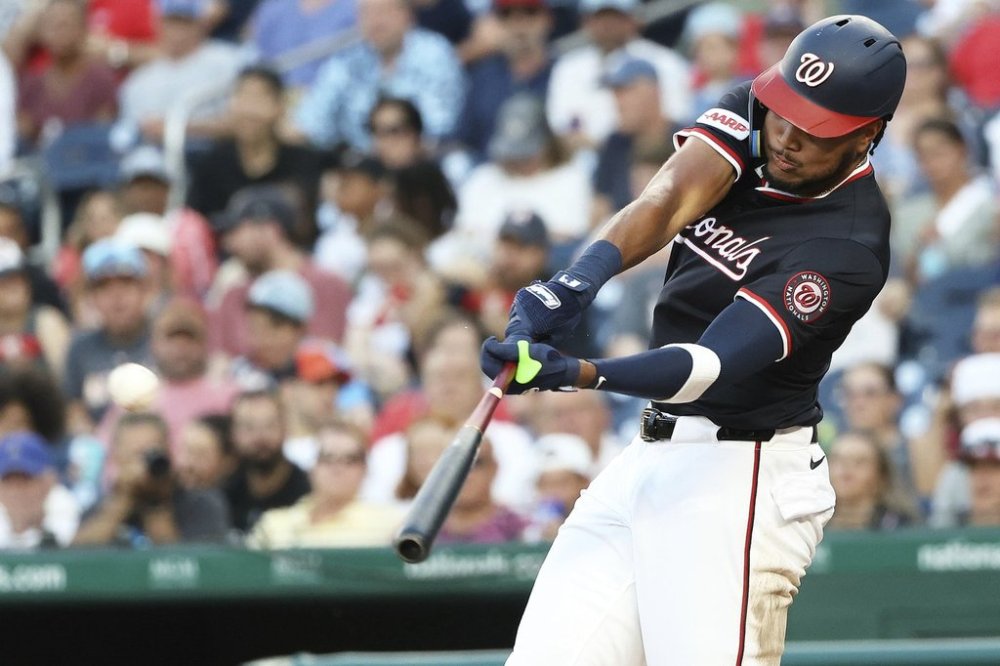 Washington Nationals' James Wood hits an RBI single during the fourth inning of a baseball game against the Detroit Tigers, Thursday, July 3, in Washington. (AP Photo/Daniel Kucin Jr.)