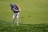Thriston Lawrence, of South Africa, hits from the 18th fairway during the first round of the U.S. Open golf tournament at Oakmont Country Club Thursday, June 12, 2025, in Oakmont, Pa. (AP Photo/Charlie Riedel)