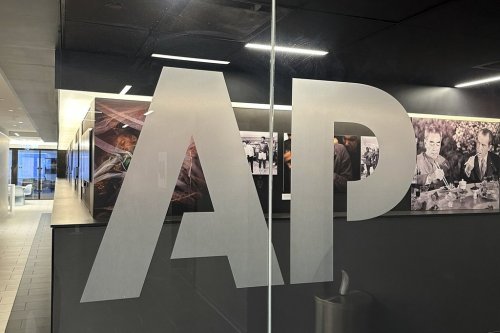 FILE - The Associated Press logo is displayed at the news organization's world headquarters in New York on April 9, 2025. (AP Photo/Aaron Jackson, File)