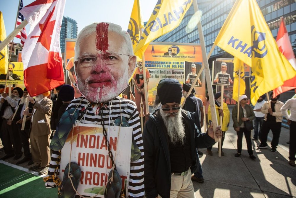 Protesters gather to protest the arrival of Prime Minister of India Narendra Modi at the G7 summit, in Calgary, on Monday, June 16, 2025. THE CANADIAN PRESS/Jason Franson