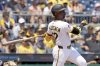 Pittsburgh Pirates' Andrew McCutchen watches his three-run home run during the fifth inning of a baseball game against the Miami Marlins, Wednesday, June 11, 2025, in Pittsburgh. (AP Photo/Matt Freed)