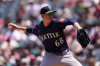 Seattle Mariners starting pitcher George Kirby throws to the plate during the first inning of a baseball game against the Los Angeles Angels, Sunday, June 8, 2025, in Anaheim, Calif. (AP Photo/Mark J. Terrill)
