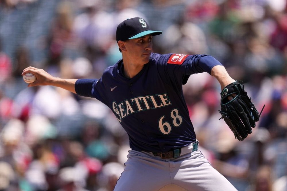 Seattle Mariners starting pitcher George Kirby throws to the plate during the first inning of a baseball game against the Los Angeles Angels, Sunday, June 8, 2025, in Anaheim, Calif. (AP Photo/Mark J. Terrill)