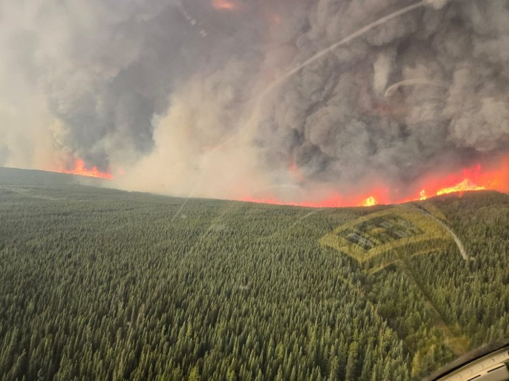The Pocket Knife Creek wildfire south of Fort Nelson, B.C., seen in this handout photo on Wednesday, June 10, 2025, is now classified as