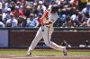 San Francisco Giants' Rafael Devers (16) connects for a two-run home run in the fourth inning in the fourth inning of a baseball game against the Boston Red Sox, Saturday, June 21, 2025, in San Francisco. (Jose Carlos Fajardo/Bay Area News Group via AP)