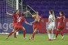 Canada midfielder Sarah Stratigakis (10) celebrates with teammates after scoring a goal during the second half of a SheBelieves Cup soccer match against Argentina, Sunday, Feb. 21, 2021, in Orlando, Fla. (AP Photo/Phelan M. Ebenhack)
