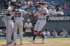 Detroit Tigers' Parker Meadows, left, and Javier Baez (28) congratulate Trey Sweeney (27) after his three-run home run off Cleveland Guardians relief pitcher Cade Smith during the 10th inning of a baseball game, Sunday, July 6, 2025, in Cleveland. (AP Photo/Phil Long)