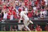 Cincinnati Reds' Will Benson celebrates as he rounds first base after hitting a walk-off single in the ninth inning of a baseball game against the San Diego Padres, Sunday, June 29, 2025, in Cincinnati. (AP Photo/Kareem Elgazzar)