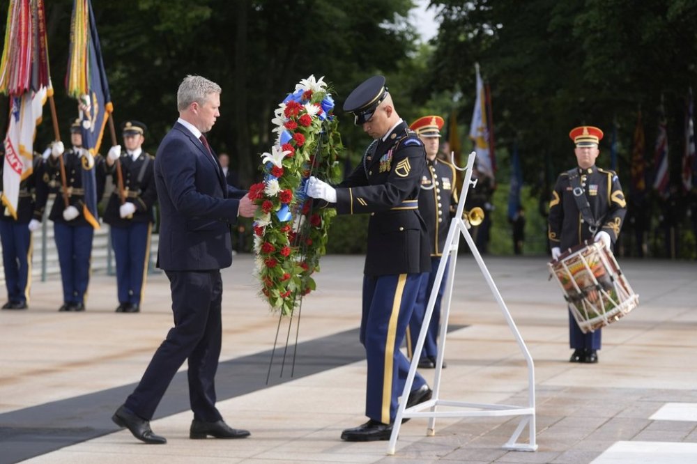 Secretary of the Army Daniel Driscoll lays a wreath at the Tomb of the Unknown Soldier at Arlington National Cemetery, honoring the Army's 250th anniversary and coinciding with President Donald Trump's 79th birthday, Saturday, June 14, 2025, in Arlington, Va. (AP Photo/Manuel Balce Ceneta)