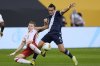 Canada defender Alistair Johnston (2) and Guatemala forward Rubio Mendez (9) battle for possession of the ball during the first half of a CONCACAF Gold Cup quarterfinals soccer match Sunday, June 29, 2025, in Minneapolis. THE CANADIAN PRESS/AP-Abbie Parr