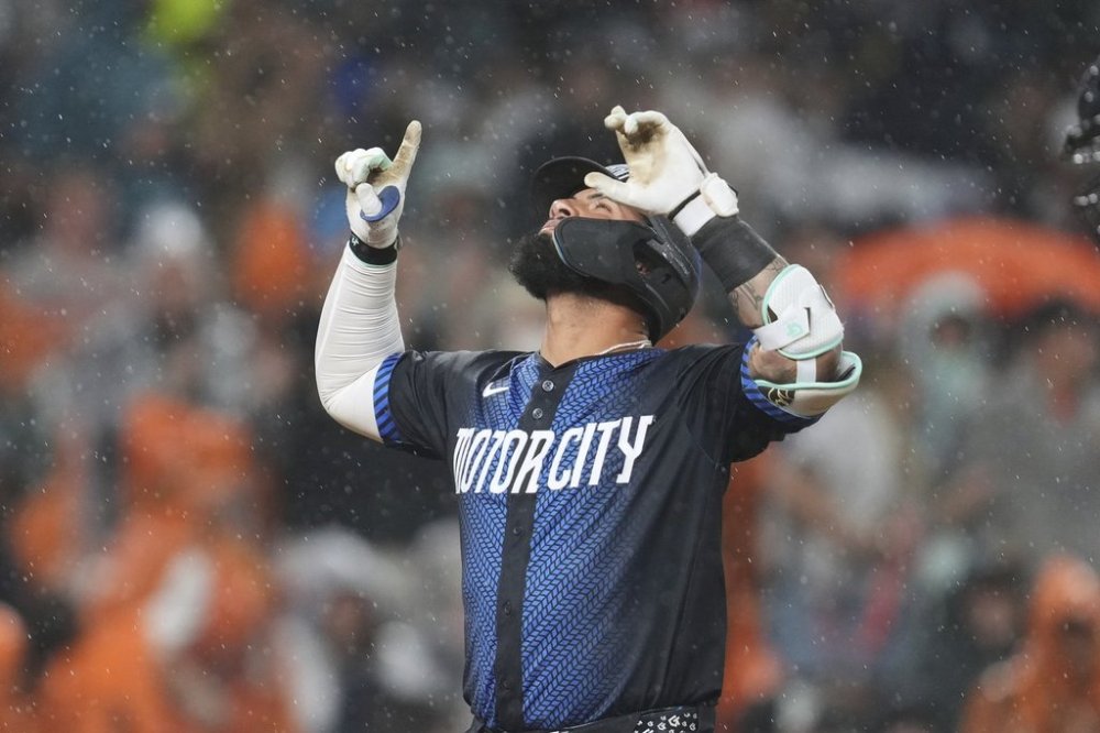 Detroit Tigers' Gleyber Torres celebrates his home run against the Cincinnati Reds in the seventh inning during a baseball game, Friday, June 13, 2025, in Detroit. (AP Photo/Paul Sancya)