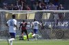 United States forward Malik Tillman (17) scores Trinidad and Tobago defender Justin Garcia (5) and goalkeeper Marvin Phillip, bottom, during the first half of a CONCACAF Gold Cup soccer match in San Jose, Calif., Sunday, June 15, 2025. (AP Photo/Jeff Chiu)