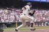 San Francisco Giants' Mike Yastrzemski watches his two-run double during the fourth inning of a baseball game against the Atlanta Braves in San Francisco, Sunday, June 8, 2025. (AP Photo/Jeff Chiu)
