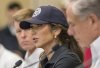 Homeland Security Secretary Kristi Noem, center, and Texas Gov. Greg Abbott, right, discuss the ongoing search and rescue efforts after recent flooding along the Guadalupe River during a press conference on Saturday, July 5, 2025, in Kerrville, Texas. (AP Photo/Rodolfo Gonzalez)